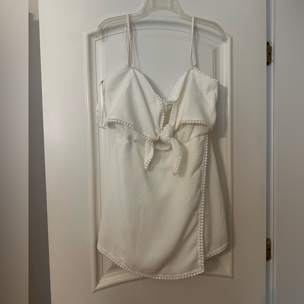 White Sleeveless Romper with Pom-Pom Trim